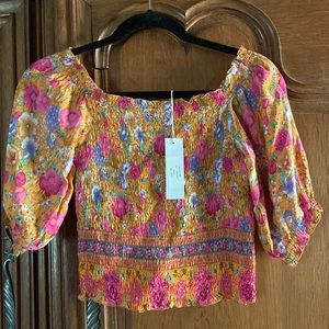 Jules top in citrus/ orange/ pink / lavender floral size S/M .